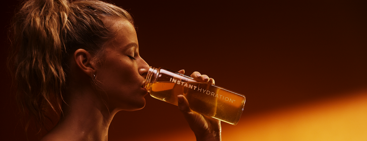 Athlete drinking Instant Hydration Energy+